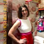 Sarah Cody Roth standing in the WestSide Baby Diaper Warehouse